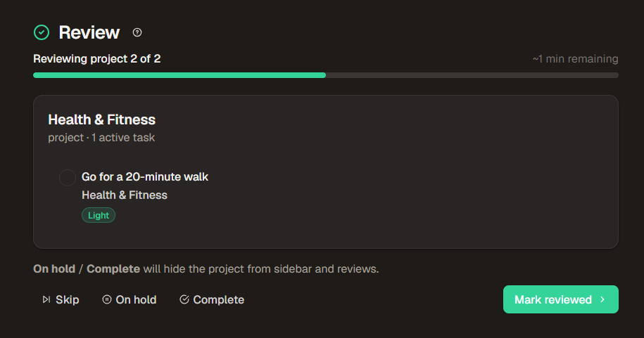 Weekly review walkthrough showing project progress, active tasks, and Mark reviewed button